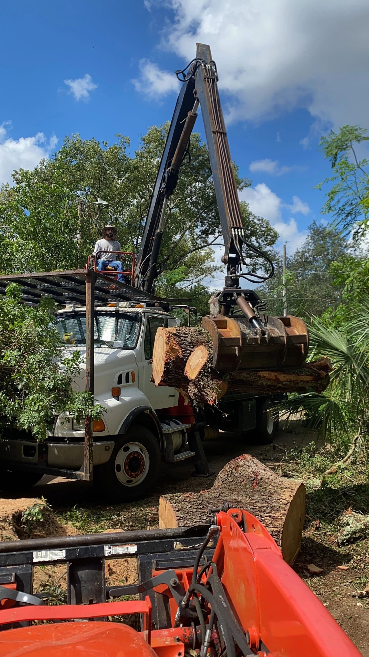 Grapple Truck Debris Hauling